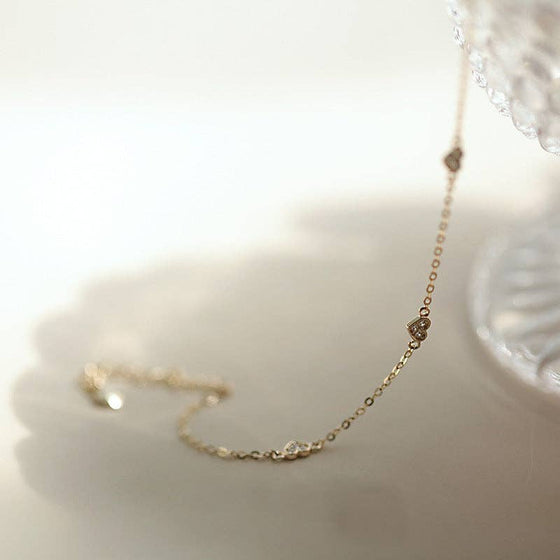 Dainty Gold Triple Heart Bracelet in 925 Sterling Silver